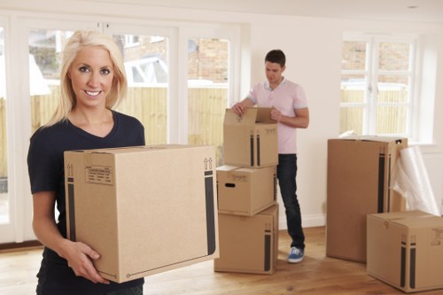 Packed moving boxes and furniture ready for house removals in Hampstead
