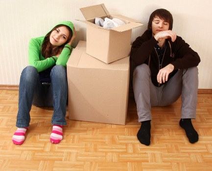 Removal team planning a house move on a Hampstead residential street