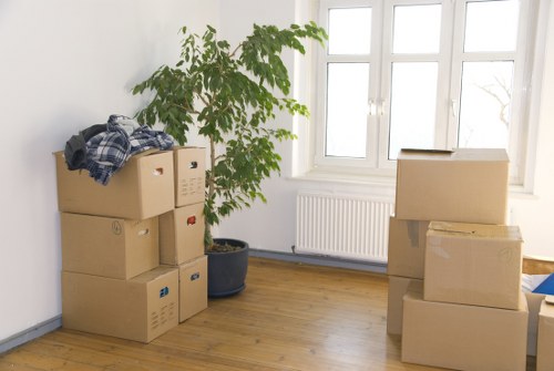 Packed household boxes and furniture ready for a Hampstead property relocation