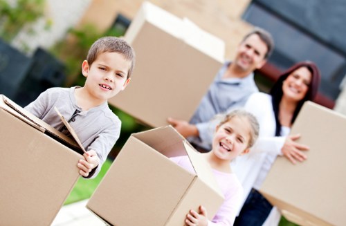 Trained removal staff carrying items carefully during a move