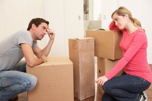 Removal crew loading items for a Hampstead property move