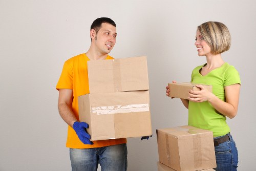 Worker assessing a moving task with careful planning and hazard awareness
